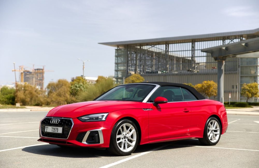 Sporty red Audi A5 Cabrio 2022 convertible for rent in Dubai, perfect for a stylish and dynamic ride