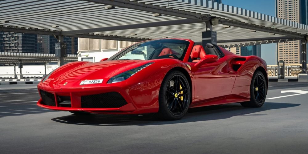 Rent a red Ferrari 488 Spyder in Dubai for an unforgettable experience. This luxurious convertible, featuring a powerful engine and sleek design, is perfect for those who want to make a statement and enjoy the thrill of driving through the streets of Dubai.