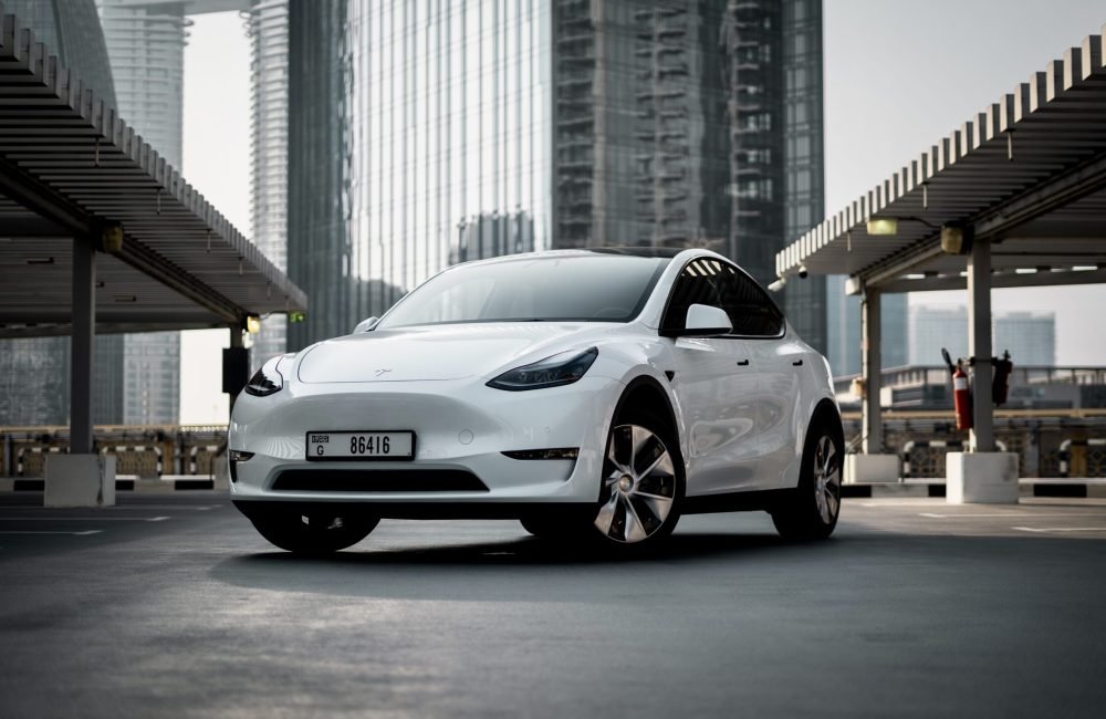 Futuristic white Tesla Model Y Long Range 2022 for rent in Dubai offering advanced technology luxurious comfort and exceptional electric performance