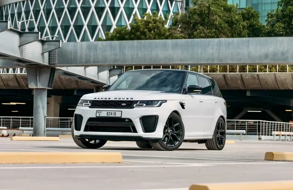 Exclusive white Range Rover Sport SVR 2023 for rent in Dubai offering high-performance luxury advanced features and dynamic design
