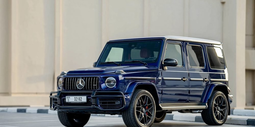 Powerful dark blue Mercedes G63 AMG 2023 for rent in Dubai offering luxurious comfort advanced technology and high-performance driving for an elite experience