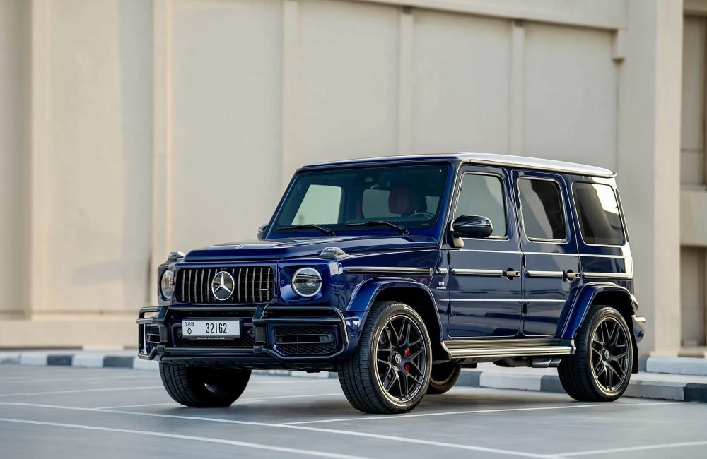 Powerful dark blue Mercedes G63 AMG 2023 for rent in Dubai offering luxurious comfort advanced technology and high-performance driving for an elite experience
