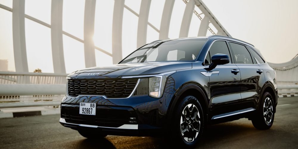 Elegant dark blue Kia Sorento 2024 for rent in Dubai offering modern design spacious comfort and advanced features for a smooth driving experience