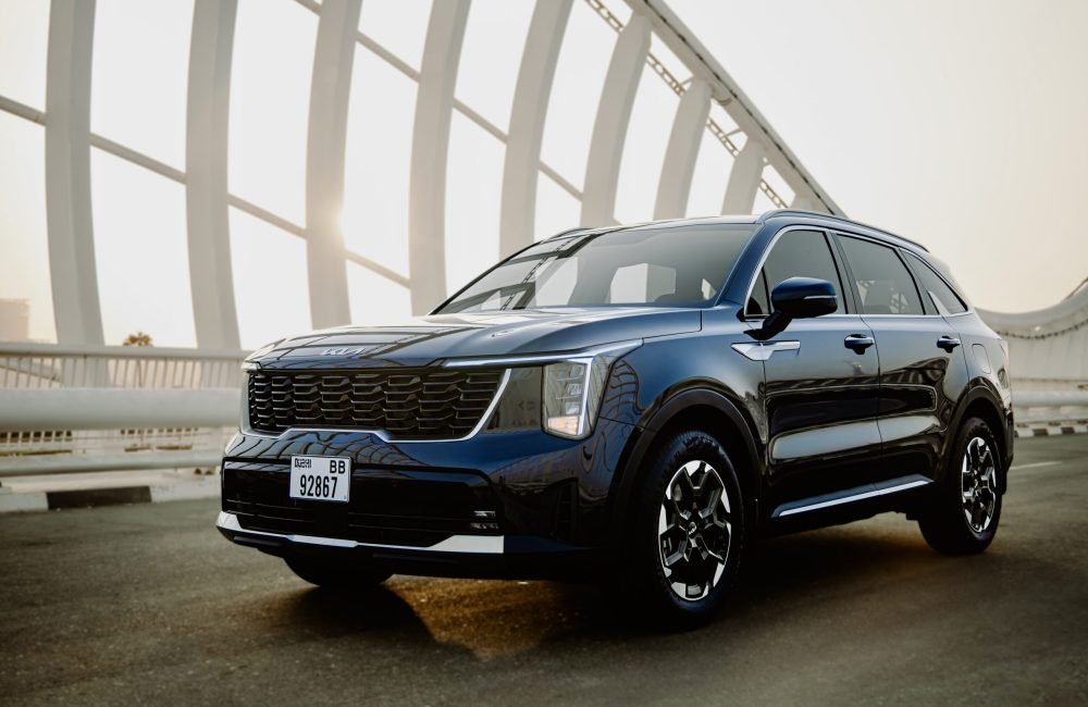 Elegant dark blue Kia Sorento 2024 for rent in Dubai offering modern design spacious comfort and advanced features for a smooth driving experience