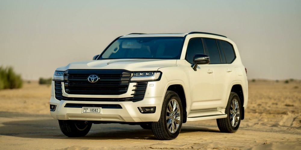 Powerful white Toyota Land Cruiser 300 2023 for rent in Dubai offering premium comfort advanced technology and exceptional performance for any terrain or journey