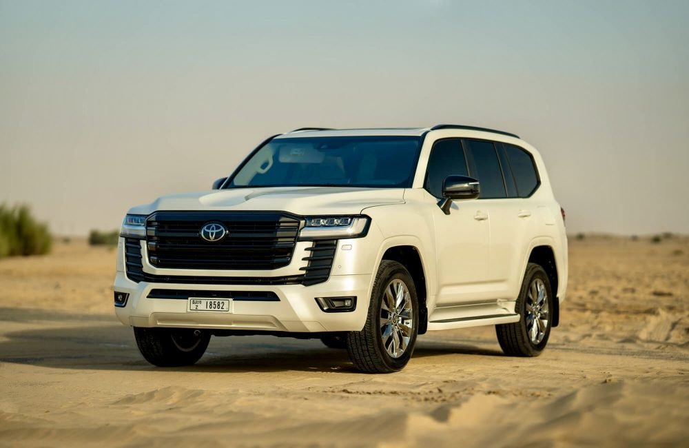Powerful white Toyota Land Cruiser 300 2023 for rent in Dubai offering premium comfort advanced technology and exceptional performance for any terrain or journey