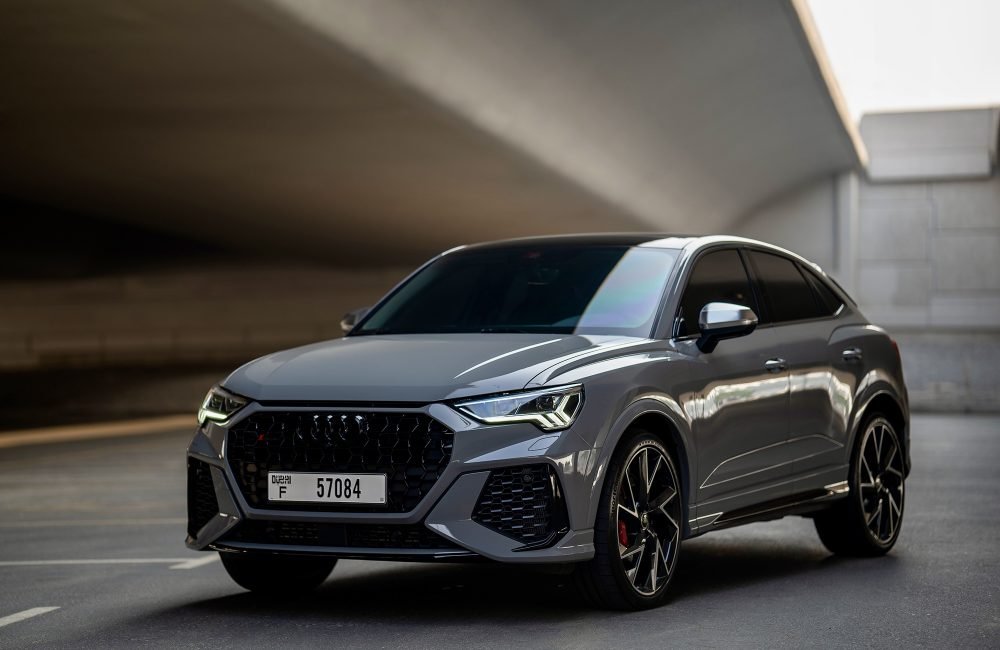Sporty grey Audi RS Q3 for rent in Dubai offering dynamic performance modern design and advanced features for a thrilling and luxurious driving experience