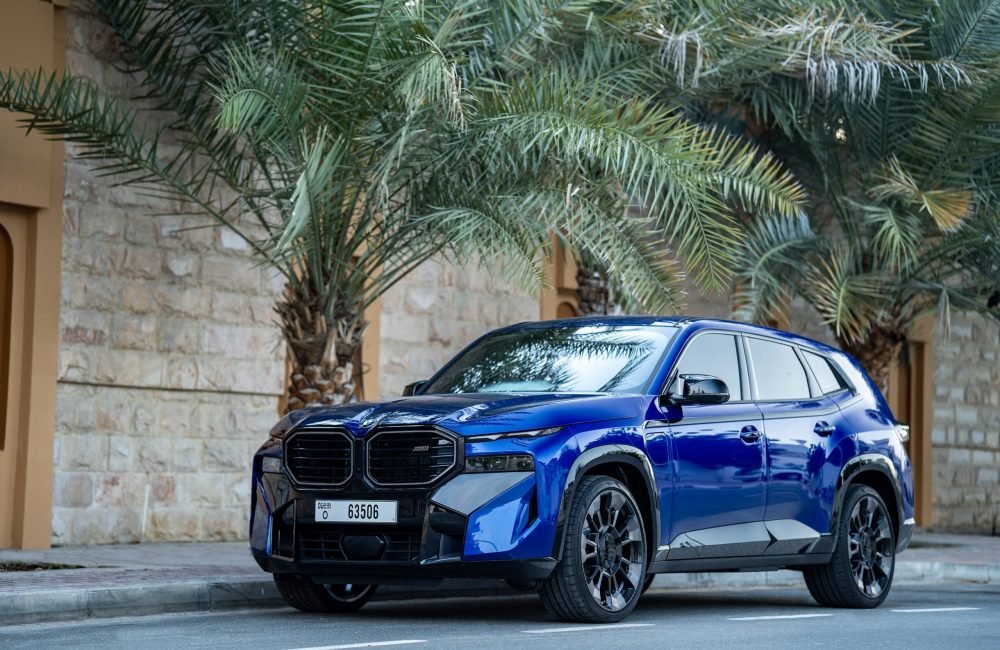 Exclusive blue BMW XM 2024 for rent in Dubai offering high-performance hybrid power luxurious comfort and advanced technology for a premium driving experience
