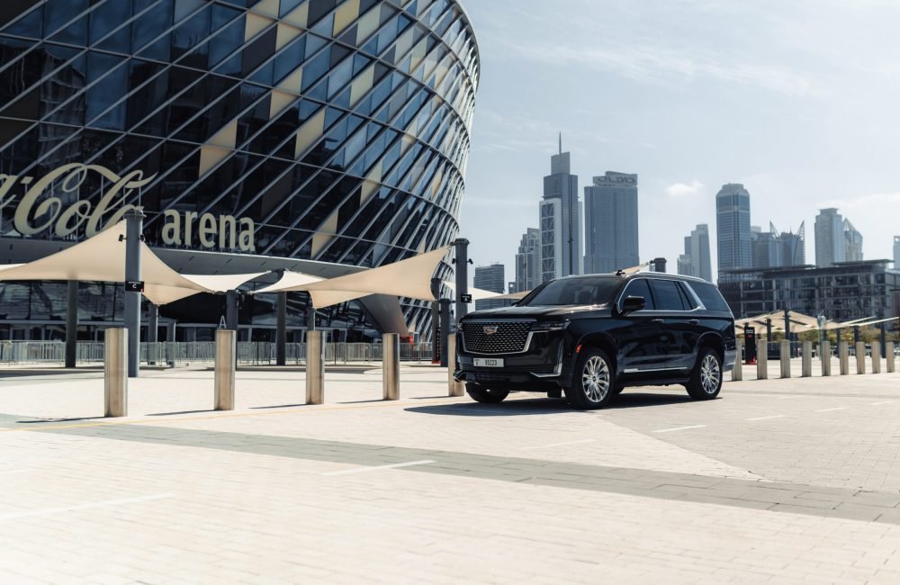 Elegant black Cadillac Escalade 2023 for rent in Dubai offering premium luxury advanced features and powerful performance for a first-class driving experience