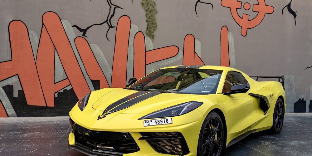 Bold yellow Chevrolet Corvette C8 for rent in Dubai offering thrilling performance striking design and advanced technology for an unforgettable sports car experience