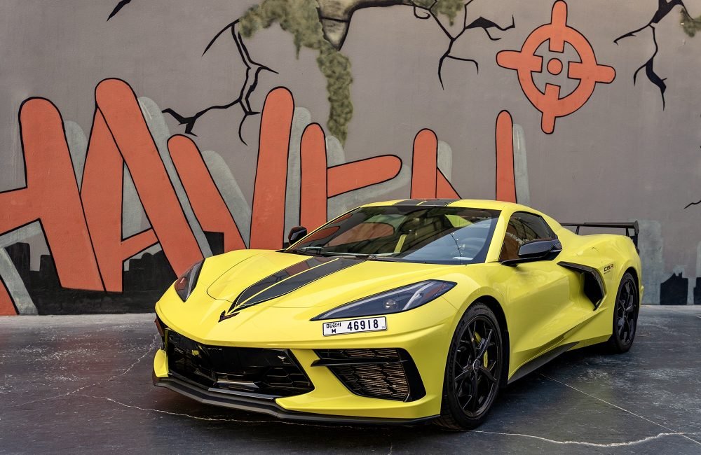 Bold yellow Chevrolet Corvette C8 for rent in Dubai offering thrilling performance striking design and advanced technology for an unforgettable sports car experience