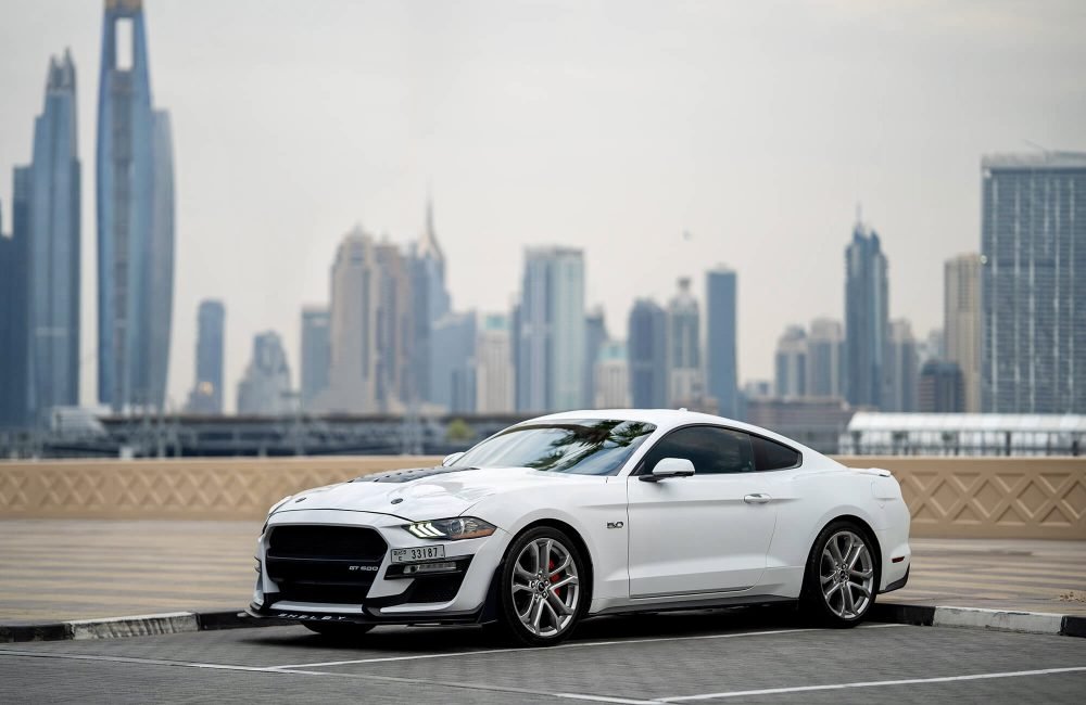 Stylish white Ford Mustang GT for rent in Dubai offering powerful performance sleek design and modern features for an exhilarating driving experience