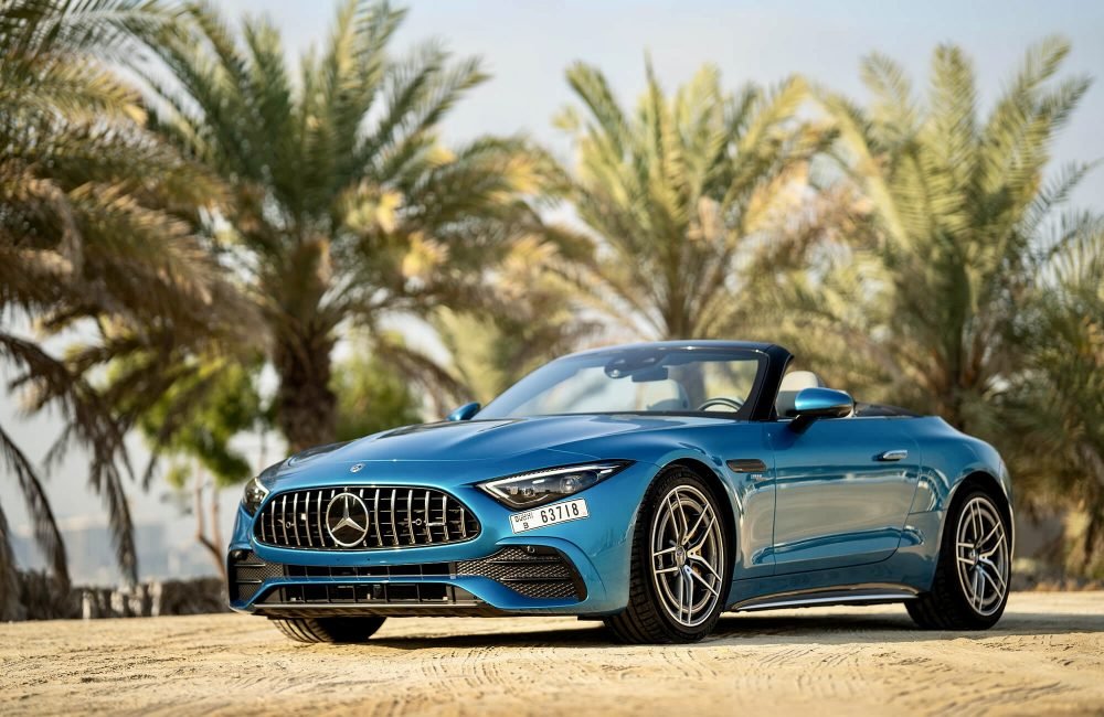 Elegant blue Mercedes SL 43 for rent in Dubai offering a luxurious open-top driving experience with advanced technology sleek design and dynamic performance
