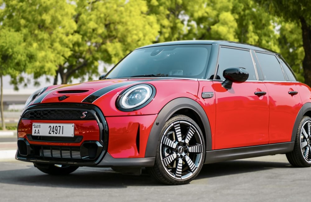 Vibrant red Mini Cooper S 2023 for rent in Dubai offering sporty design agile performance and modern features for an exciting and stylish driving experience