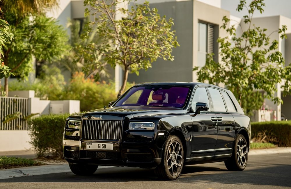 Luxurious black Rolls Royce Cullinan 2023 for rent in Dubai offering unparalleled elegance advanced technology and powerful performance for a first-class driving experience